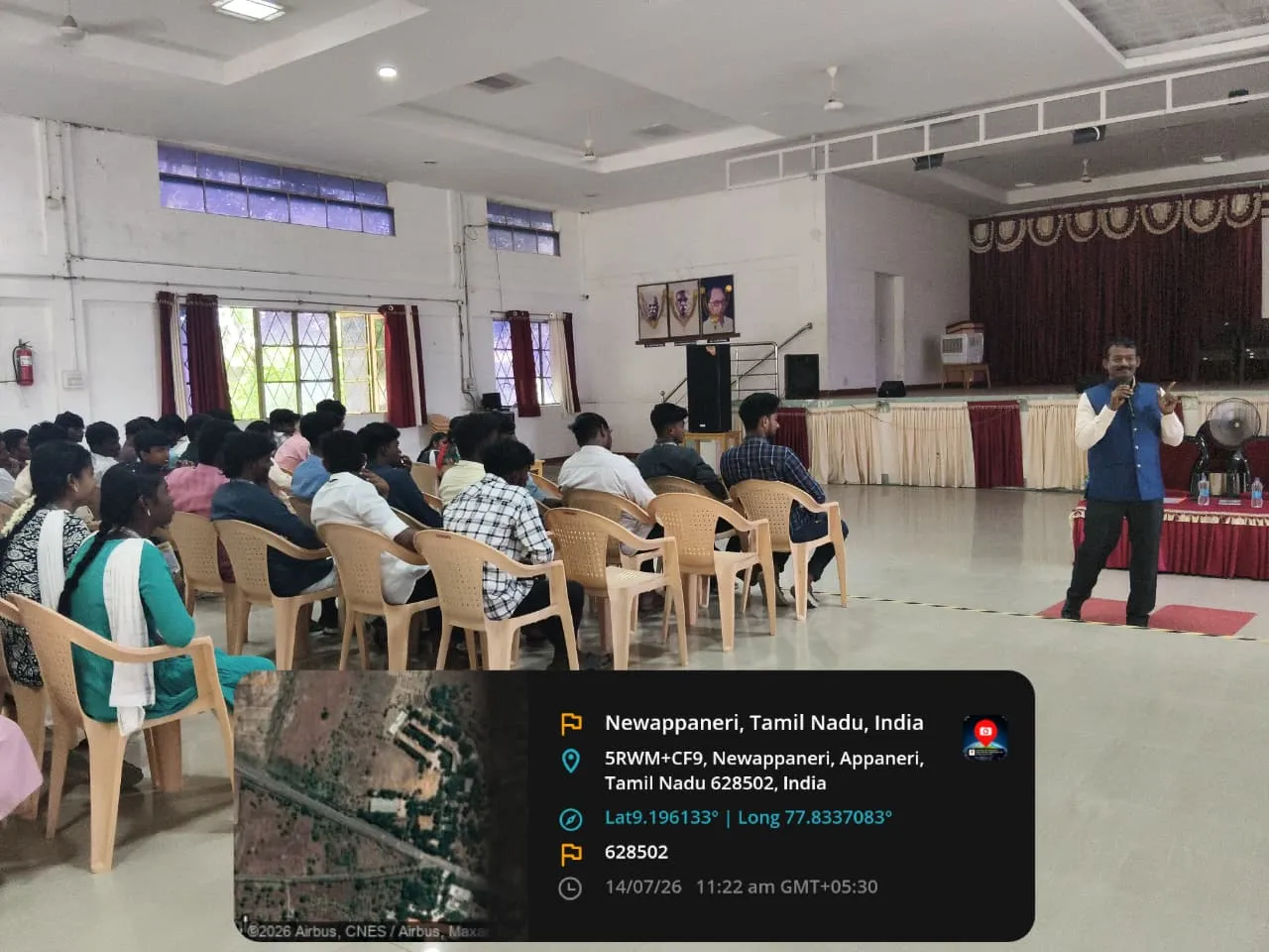 Attendees gathered together during an indoor programme