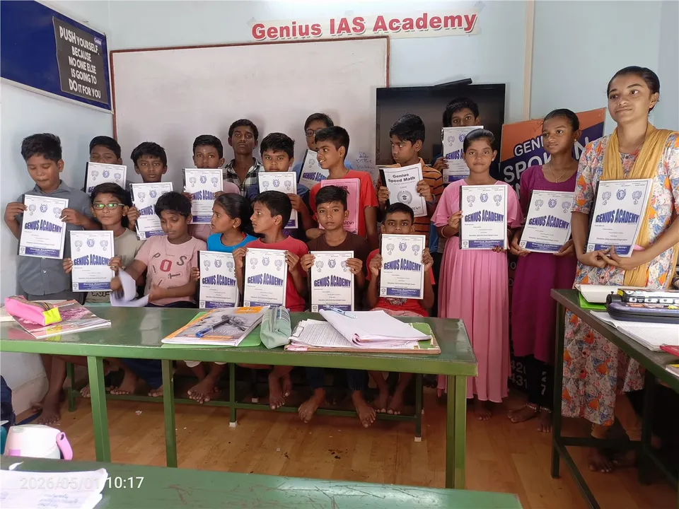 Children standing together and holding certificates