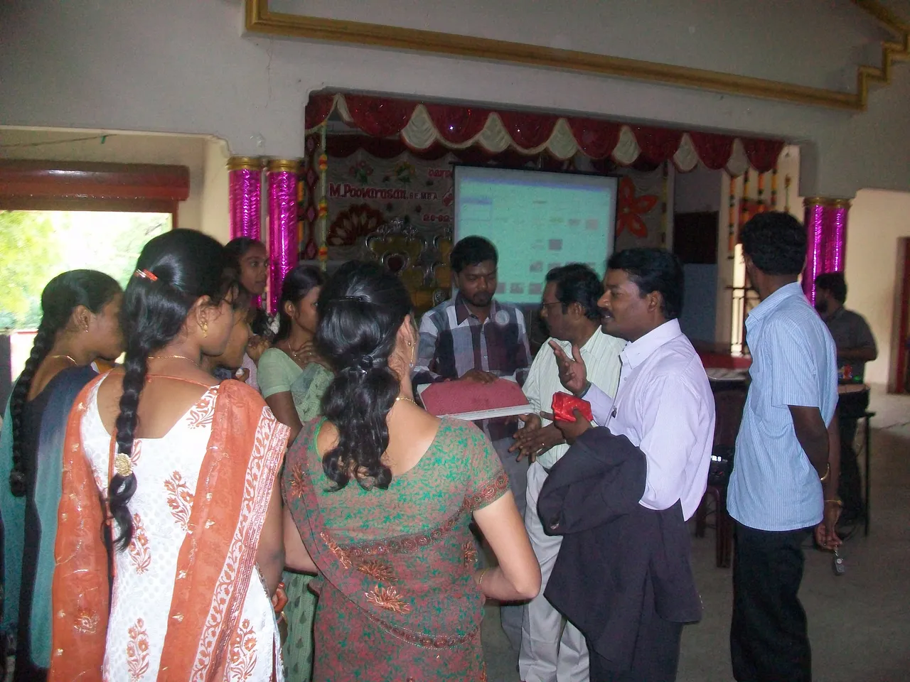 Speaker addressing school students seated in a hall